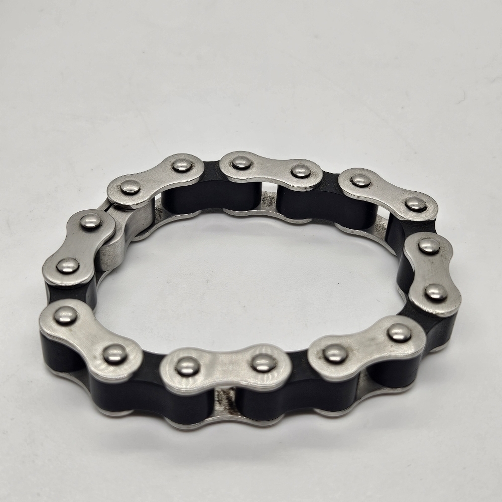 silver tone and black bicycle chain style bracelet